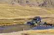 Car crossing small river in Northern Mongolia, Mongolia