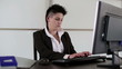 Young punk businesswoman during work in the office