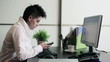 Young punk businesswoman with smartphone in the office