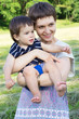 Young mother with son outdoor