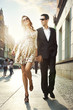 Happy couple in a city center