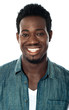 Photo: Closeup of cheerful young african guy Closeup of cheerful young african guy