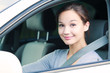 Cute girl in a white car