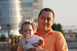 Portrait of father and young blond daughter in panama