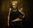 Girl with a quiver against grunge wall