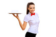 Foto: Young waitress with an empty tray Young waitress with an empty tray