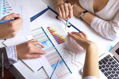 Photo: Financial papers on the table Financial papers on the table