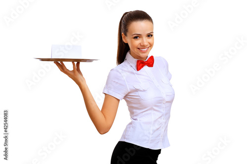 Foto: Young waitress with an empty tray Young waitress with an empty tray