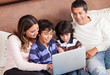 Foto: Family with a laptop Family with a laptop