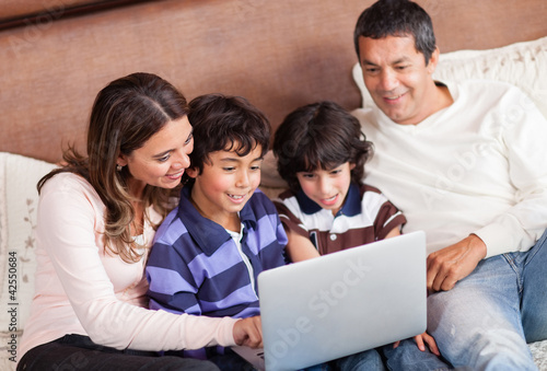 Photo: Family with a laptop Family with a laptop