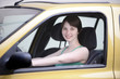 Photo: Happy woman in her new car Happy woman in her new car