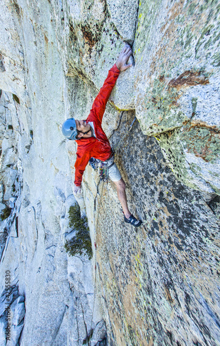 Photo: Climber gripping the rock. Climber gripping the rock.