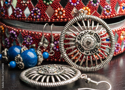 Photo: Old indian jewelery box with the earrings. Old indian jewelery box with the earrings.