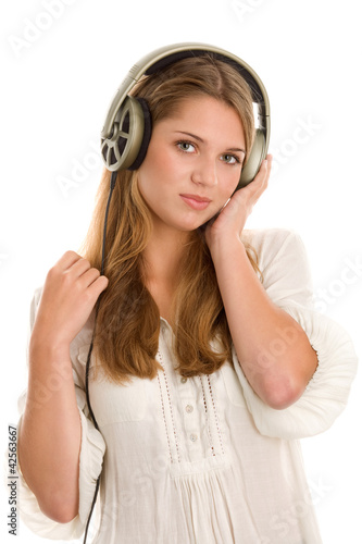 Photo: Young woman listening to music Young woman listening to music