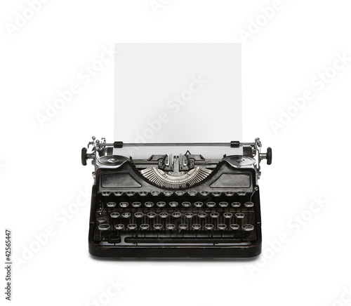 Photo: Retro rusty typewriter isolated on white background Retro rusty typewriter isolated on white background