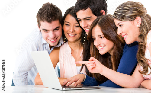 Photo: Friends with a laptop Friends with a laptop