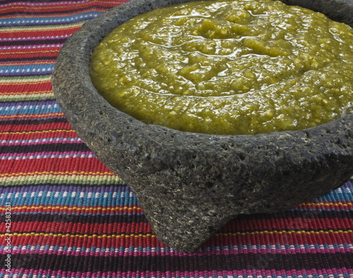 Photo: Close-up of A serving of Green Chili Salsa in a Molcajete Close-up of A serving of Green Chili Salsa in a Molcajete