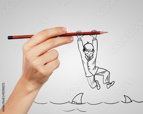 Foto: Businessman in risky situation Businessman in risky situation