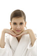 Confident, happy woman wearing bathrobe