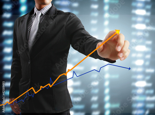 Foto: touching display screen with statistics graph and data informati touching display screen with statistics graph and data informati