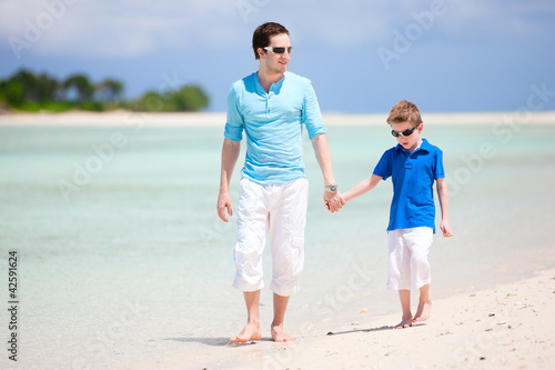 Photo: Father and son at beach Father and son at beach