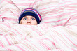Photo: Scared woman hiding in duvet Scared woman hiding in duvet