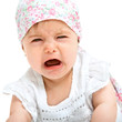 Close up of baby gril crying.