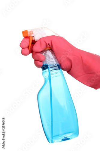 Photo: Cleaning spray in hand isolated on white Cleaning spray in hand isolated on white