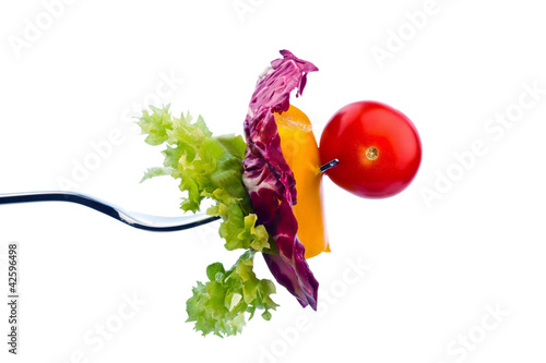 Foto : Salat auf einer Gabel Salat auf einer Gabel