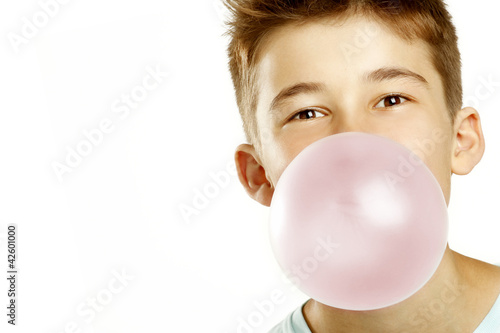 Photo: boy make bubble with chew boy make bubble with chew