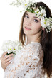 Portrait of the beautiful girl with flowers in hair