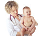 Photo: Female doctor and smiling baby patient. Female doctor and smiling baby patient.