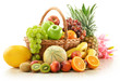 Composition with assorted fruits in wicker basket