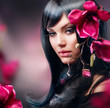 Fashion Brunette Girl with Magnolia Flower