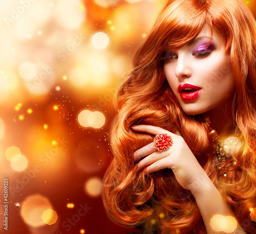 Photo: Golden Fashion Girl Portrait. Wavy Red Hair Golden Fashion Girl Portrait. Wavy Red Hair