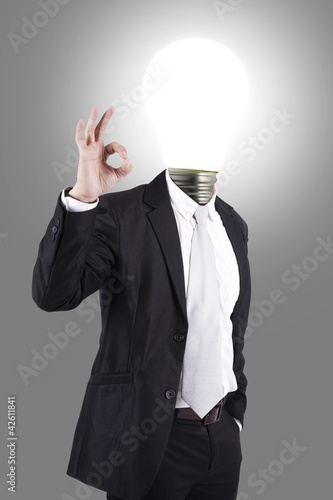 Photo: Business male with lamp-head Business male with lamp-head
