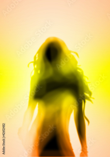 Photo: Female silhouette against colour background Female silhouette against colour background