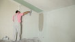 Video: Man Plastering Wall Man Plastering Wall