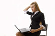 Contemplative Businesswoman With a Laptop - Isolated