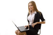 Confident Businesswoman Using a Laptop - Isolated