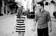 Young couple walking in the old part of town