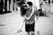 Photo: Young man giving piggyback ride to his girlfriend Young man giving piggyback ride to his girlfriend