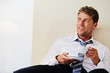 rerlaxing businessman in a hotel room