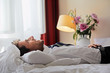 relaxing businessman in a hotel room