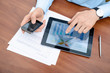 Businessman analyzing information on a modern devices