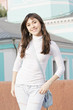 Young smiling woman outdoors