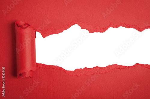 Photo: Torn red paper with space for text Torn red paper with space for text