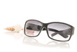 Photo: Womens Sunglasses with Shells in Background Womens Sunglasses with Shells in Background