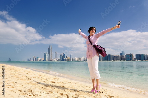 Photo: happy tourist woman happy tourist woman