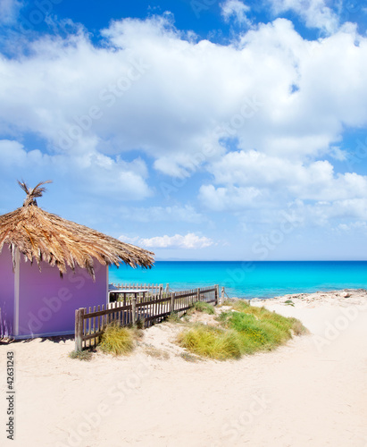Photo: Formentera tropical purple hut on turquoise beach Formentera tropical purple hut on turquoise beach